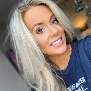 Woman smiling confidently after composite bonding treatment at Windsor Dental Practice Leicester