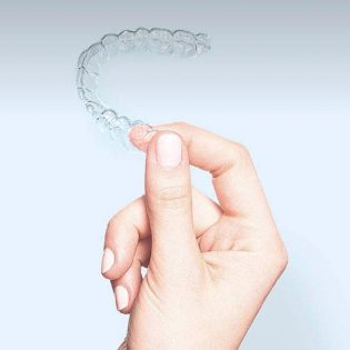 Essix dental retainer in Leicester helping keep teeth straight after orthodontic treatment